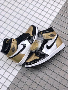 Jordan Air Jordan 1 High Gold Toe Sneakers 861428-007