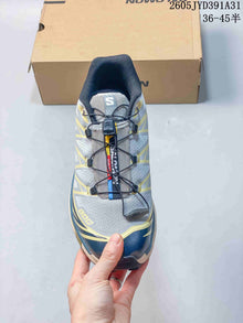 Salomon XT-6 Low-Top Sneakers in Gray, Blue and Yellow