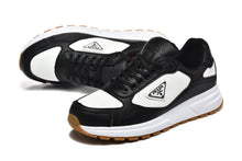 Prada Black and White Logo Low-Top Sneakers