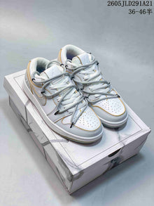 Air Jordan 1 Low White and Grey Sneakers with Gold Accents