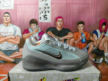 Nike Gray Low-Top Sneakers with Metallic Swoosh