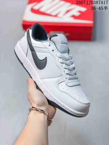 Nike Big Nike Low Sneakers in Black, Green, White and Navy