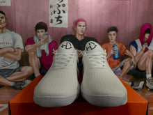 Nike White Knit-Style Sneakers with Black Swoosh