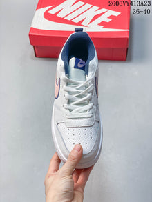 NikeCourt Borough 2 Low GS Sneakers in White and Pink