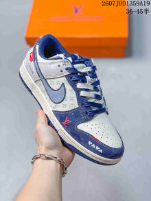 Jordan Air Jordan 1 Low Sneakers White and Navy