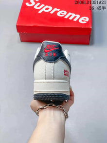 Nike Air Force 1 Low White Sneakers with Dark Swoosh