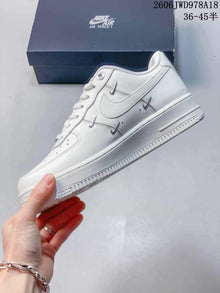 Nike Air Force 1 Low White Sneakers with Metallic Accents
