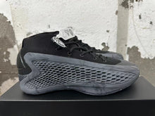 Black High-Top Basketball Sneakers with Textured Side Panels