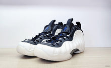 Nike Air Foamposite One High-Top Sneakers in Black, White and Blue