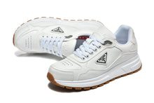 Prada White Low-Top Sneakers with Gum Sole