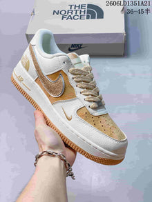 Nike Air Force 1 Low Sneakers with Glitter Swoosh