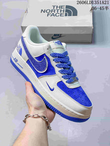Nike Air Force 1 Low Sneakers with Glitter Swoosh