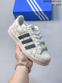 Adidas Superstar White Sneakers with Black Stripes