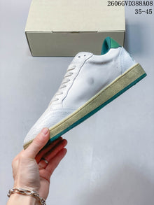 Golden Goose Super-Star White Sneakers with Green Star
