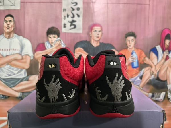 Nike Red Basketball Sneakers with Gold Swoosh