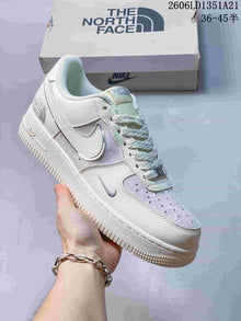 Nike Air Force 1 Low Sneakers with Glitter Swoosh