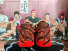 Nike Red Basketball Sneakers with Black and Orange Details