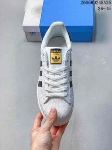 adidas Originals Superstar White and Black Low-Top Sneakers