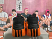 Black and Orange Sneakers