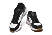 Prada Black and White Logo Low-Top Sneakers