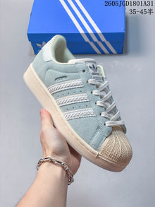 adidas Originals Campus 00s Sneakers in Blue and Cream