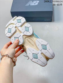 New Balance 9060 Sneakers in Aqua and Cream