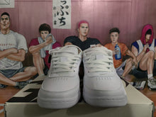 Nike White Low-Top Sneakers with Patterned Swoosh