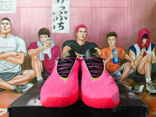 Nike Pink and Gold Basketball Shoes