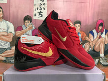Nike Red and Black Basketball Sneakers with Gold Swoosh