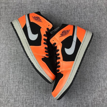 Air Jordan 1 Mid Sneakers in Black, Orange and Grey 554724-062