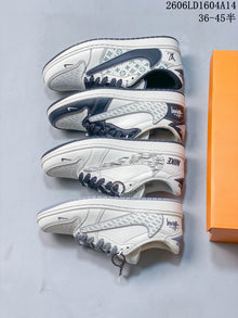 Nike Air Jordan 1 Low Graphic Sneakers in White and Navy