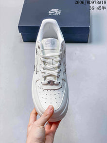 Nike Air Force 1 Low White Sneakers with Metal Swoosh Details