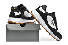 Prada Black and White Low-Top Sneakers with Gum Sole