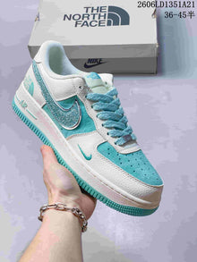 Nike Air Force 1 Low Sneakers with Glitter Swoosh