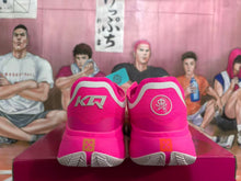 Pink Basketball Shoes with Metallic Gold Accents