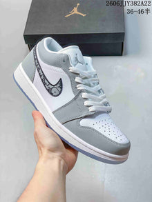 Air Jordan 1 Low White Grey Patterned Swoosh Sneakers