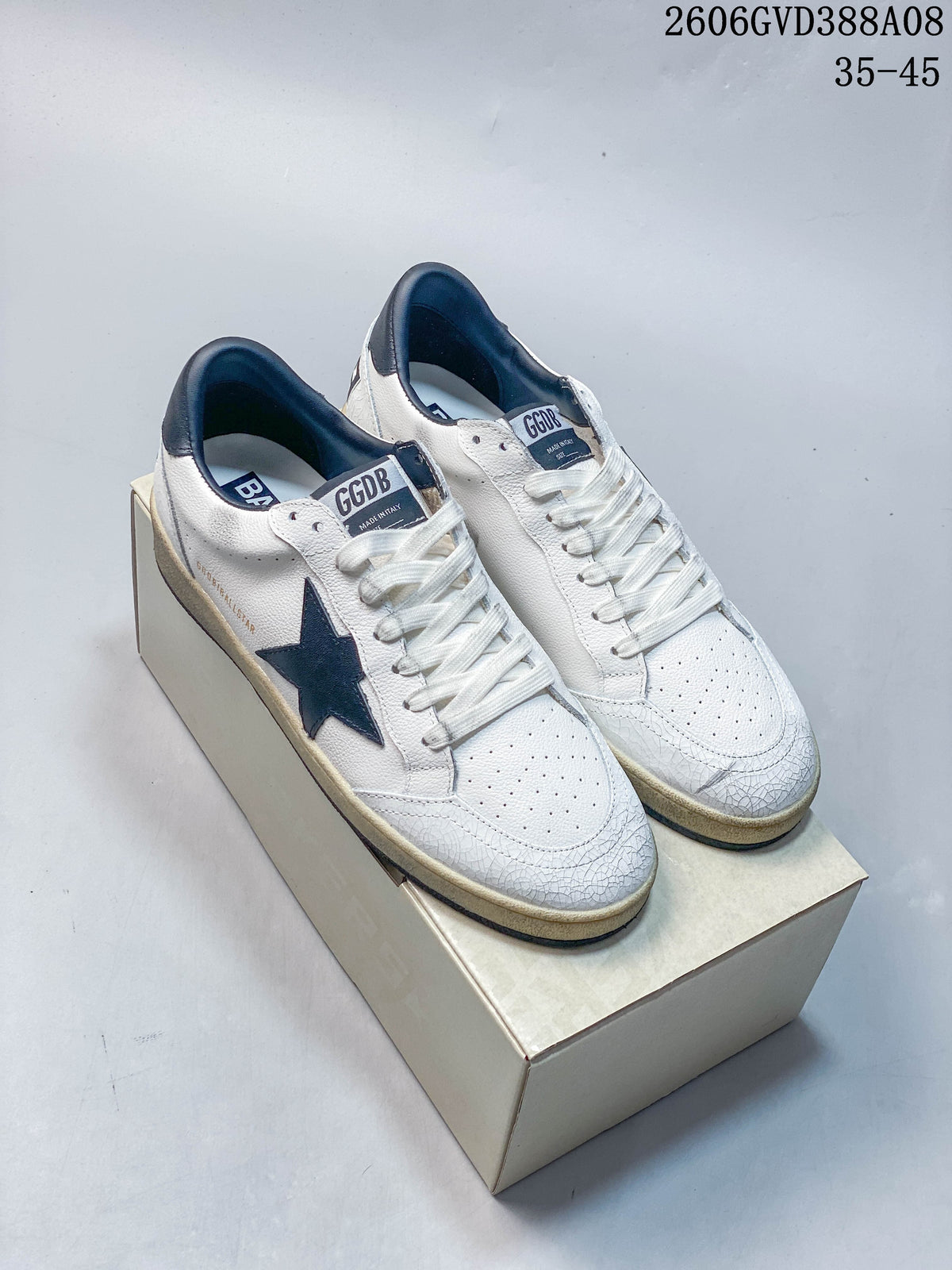 Golden Goose Super-Star White and Navy Star Sneakers 2606GVD388A08