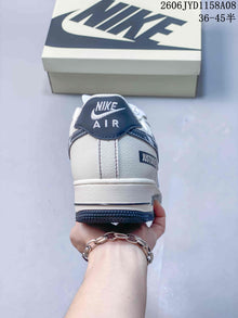 Nike Air Force 1 '07 Low Sneakers in White and Navy