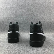 Jordan Air Jordan 1 Mid Black White 554724-049 Sneakers