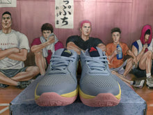 Nike Blue Basketball Sneakers with Yellow and Pink Accents