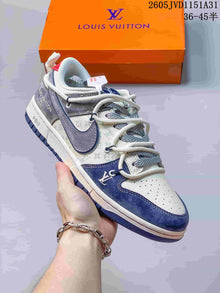 Nike SB Dunk Low Sneakers in White, Gray and Navy